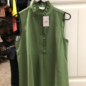 NWT sage green sleeveless blouse with ruffle detail. Size 4